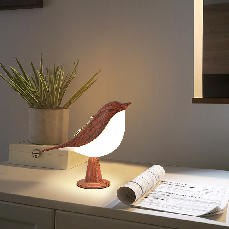 Elegant fugleformet lampe med tre LED-lysniveauer for fleksibel, energibesparende belysning og stilfuld atmosfære.