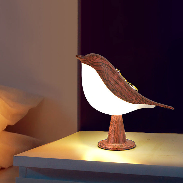 Elegant fugleformet lampe med tre LED-lysniveauer for fleksibel, energibesparende belysning og stilfuld atmosfære.