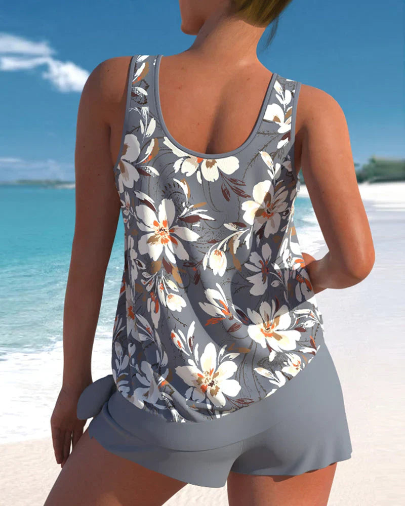 Elegant ærmeløs tankini til damer i moderne design, fås i forskellige farver, perfekt til strand og pool.