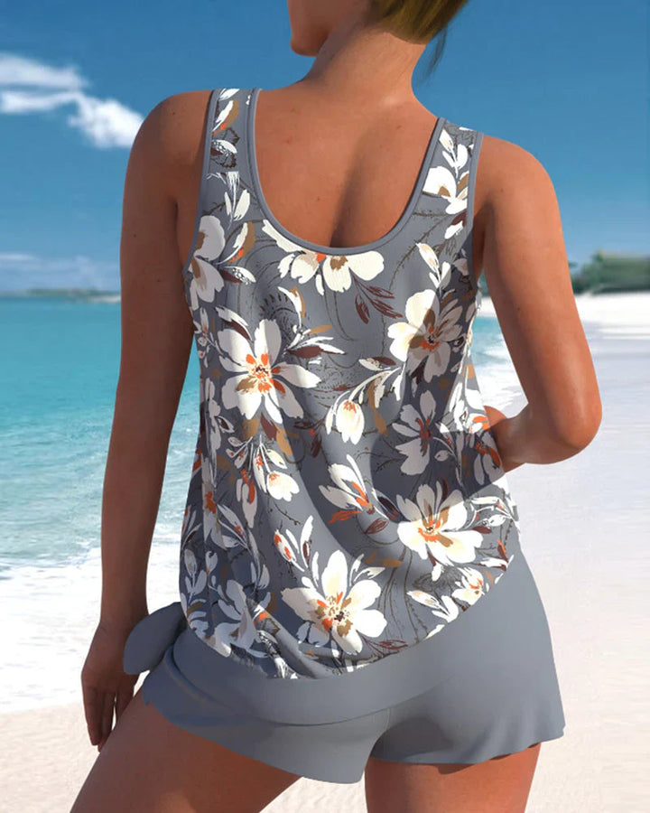 Elegant ærmeløs tankini til damer i moderne design, fås i forskellige farver, perfekt til strand og pool.