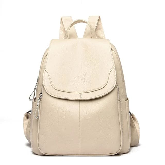 Elegant damerygsæk i beige med justerbare stropper og sikkerhedsfunktioner, ideel til hverdag og rejser.