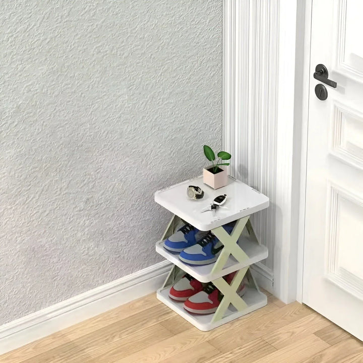 Elegant foldbart skoskab, pladsbesparende og multifunktionelt, perfekt til små rum og entréer i moderne design.