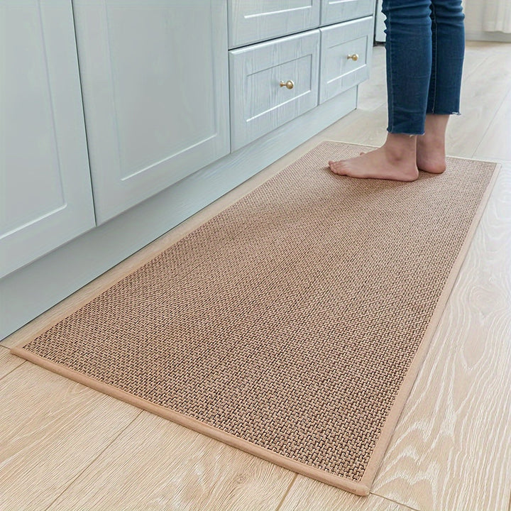 Ergonomisk køkkenmåtte i beige, polstret, skridsikker og nem at rengøre, for stilfuld komfort under madlavning.