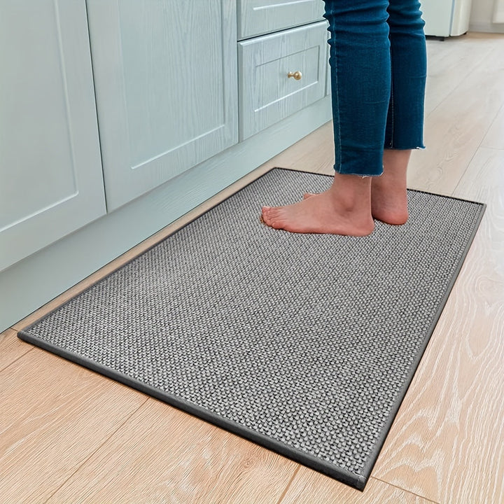 Ergonomisk køkkenmåtte i beige, polstret, skridsikker og nem at rengøre, for stilfuld komfort under madlavning.