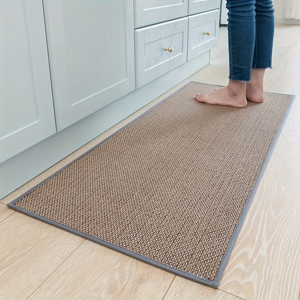 Ergonomisk køkkenmåtte i beige, polstret, skridsikker og nem at rengøre, for stilfuld komfort under madlavning.