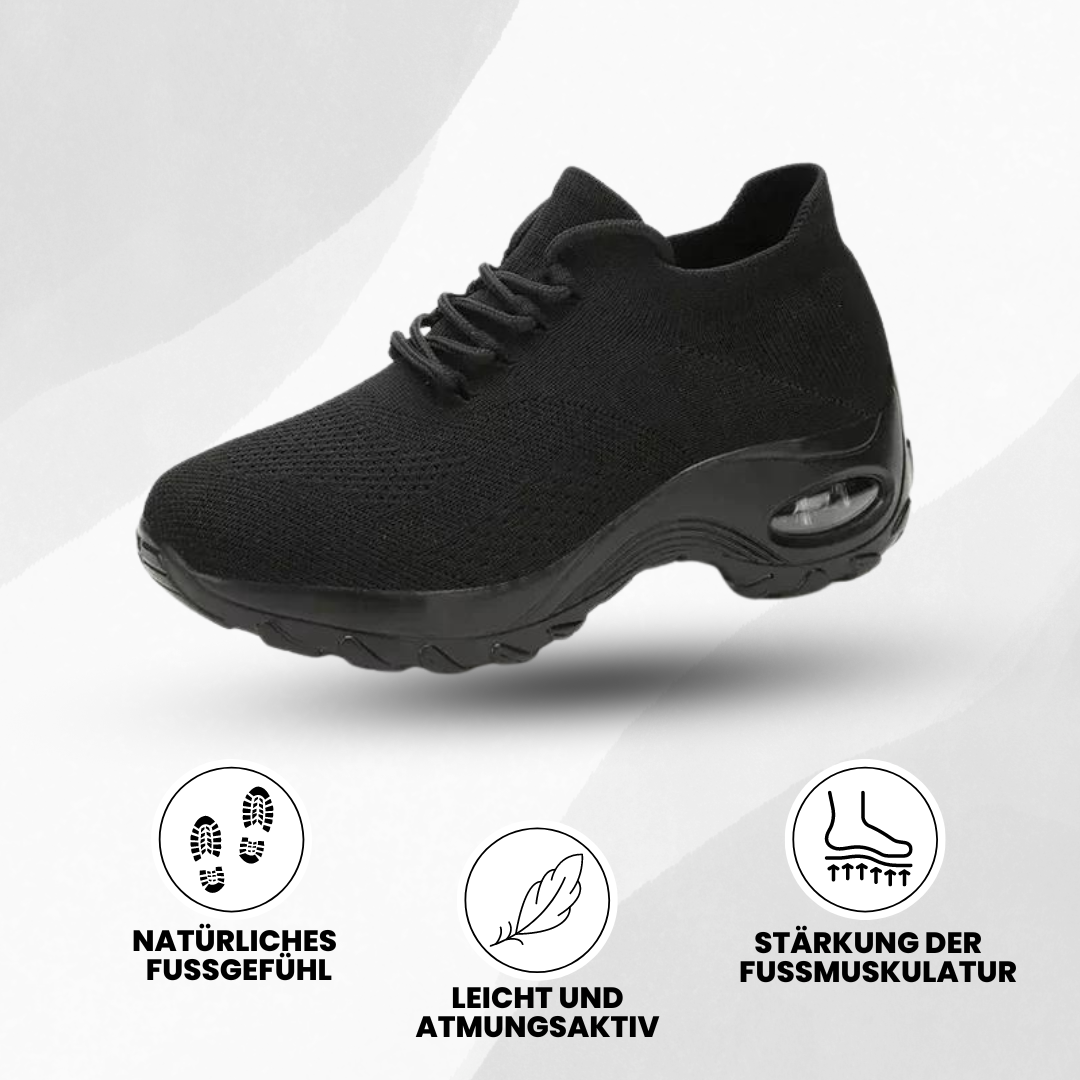 Ergonomiske Orthowalk sko i sort og hvid, tilbyder åndbar komfort og smertelindring for damer og herrer.