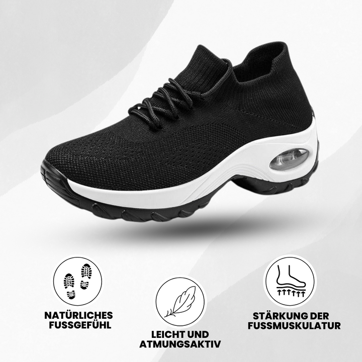 Ergonomiske Orthowalk sko i sort og hvid, tilbyder åndbar komfort og smertelindring for damer og herrer.