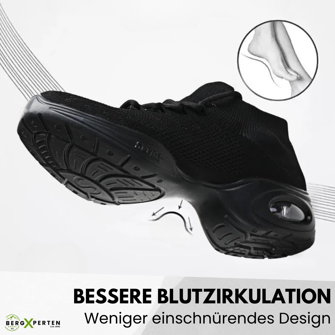 Ergonomiske Orthowalk sko i sort og hvid, tilbyder åndbar komfort og smertelindring for damer og herrer.