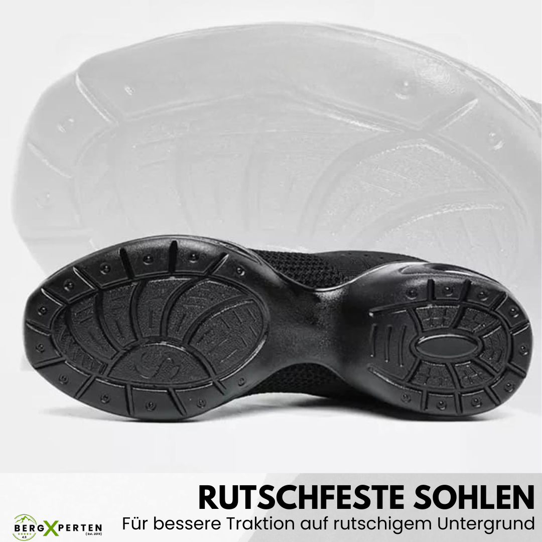 Ergonomiske Orthowalk sko i sort og hvid, tilbyder åndbar komfort og smertelindring for damer og herrer.