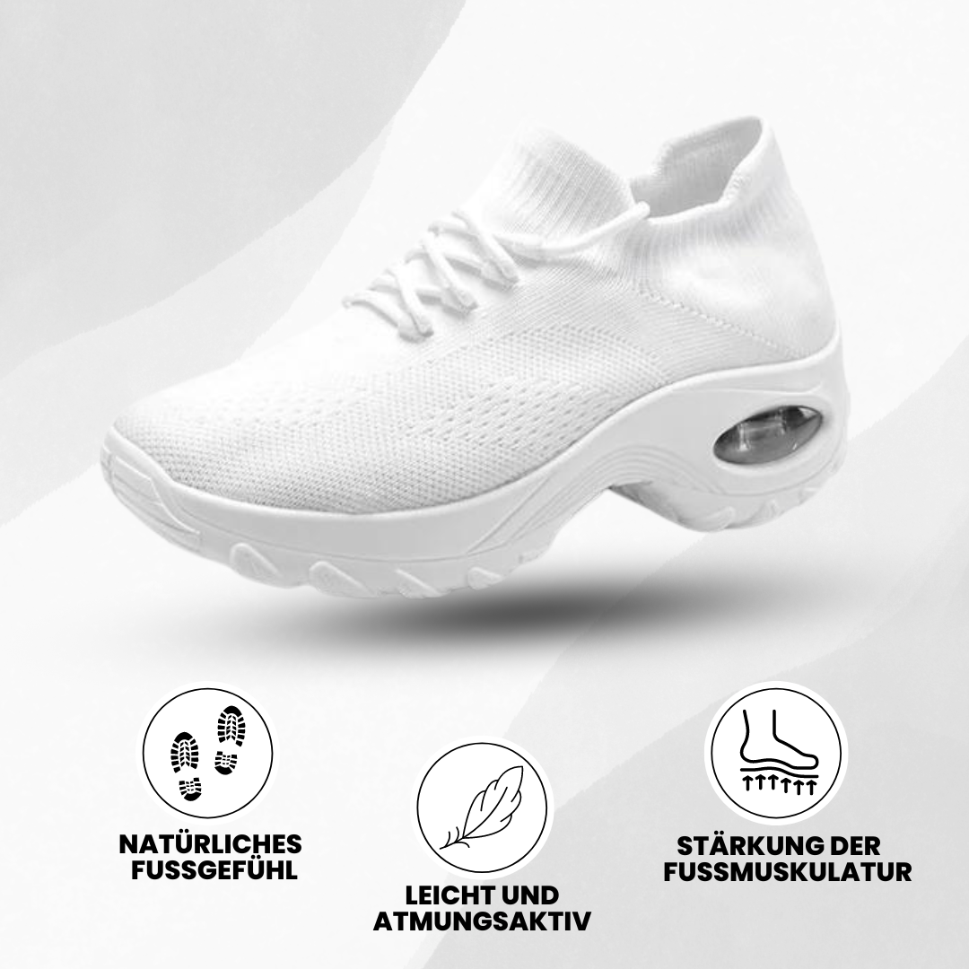 Ergonomiske Orthowalk sko i sort og hvid, tilbyder åndbar komfort og smertelindring for damer og herrer.