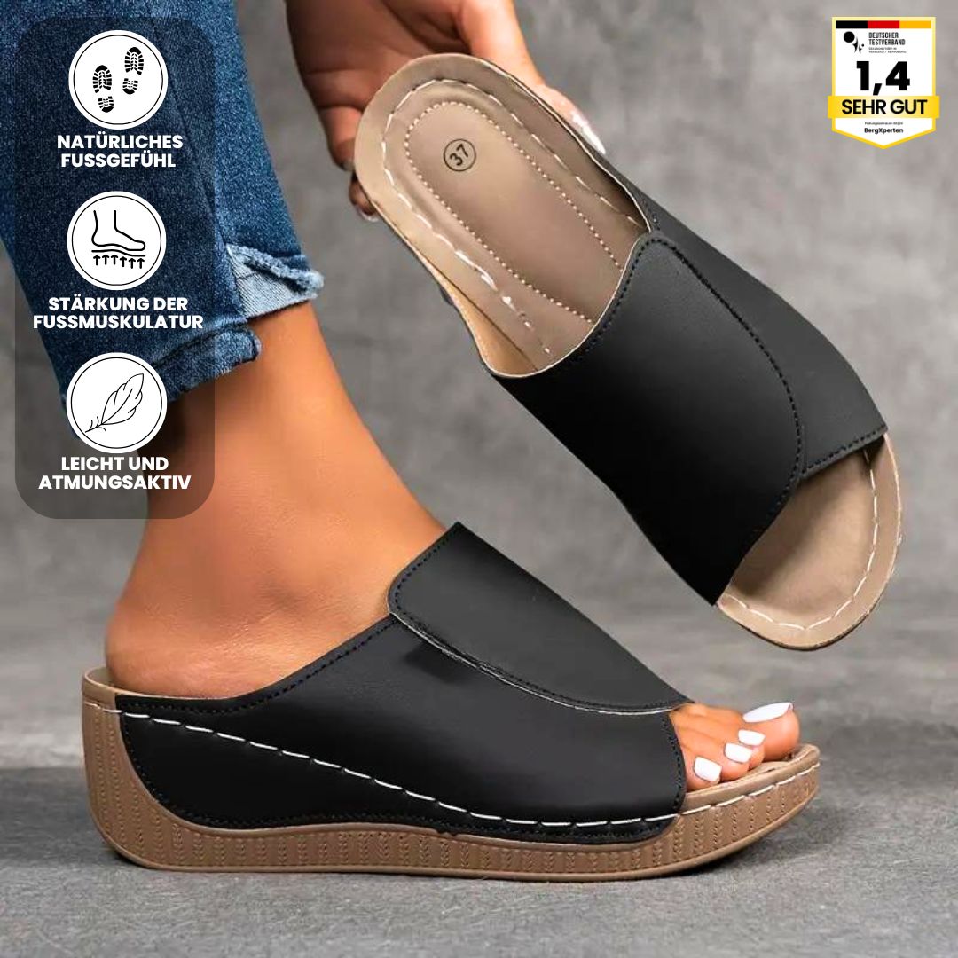 Ergonomiske, skridsikre sandaler i beige, der kombinerer komfort og stil, ideelle til enhver fodform og lejlighed.