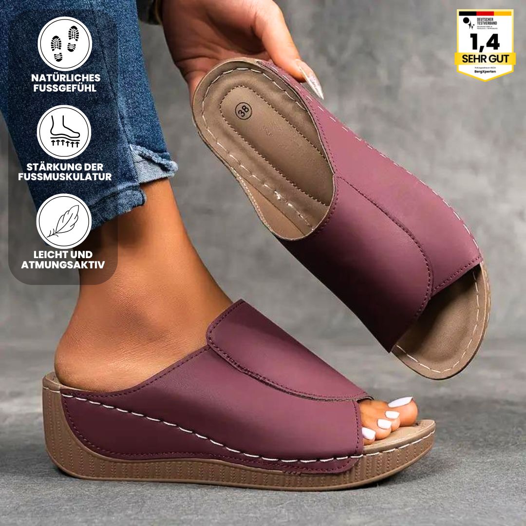 Ergonomiske, skridsikre sandaler i beige, der kombinerer komfort og stil, ideelle til enhver fodform og lejlighed.
