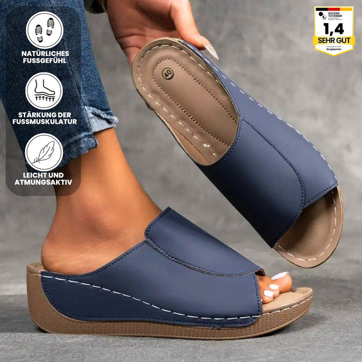 Ergonomiske, skridsikre sandaler i beige, der kombinerer komfort og stil, ideelle til enhver fodform og lejlighed.