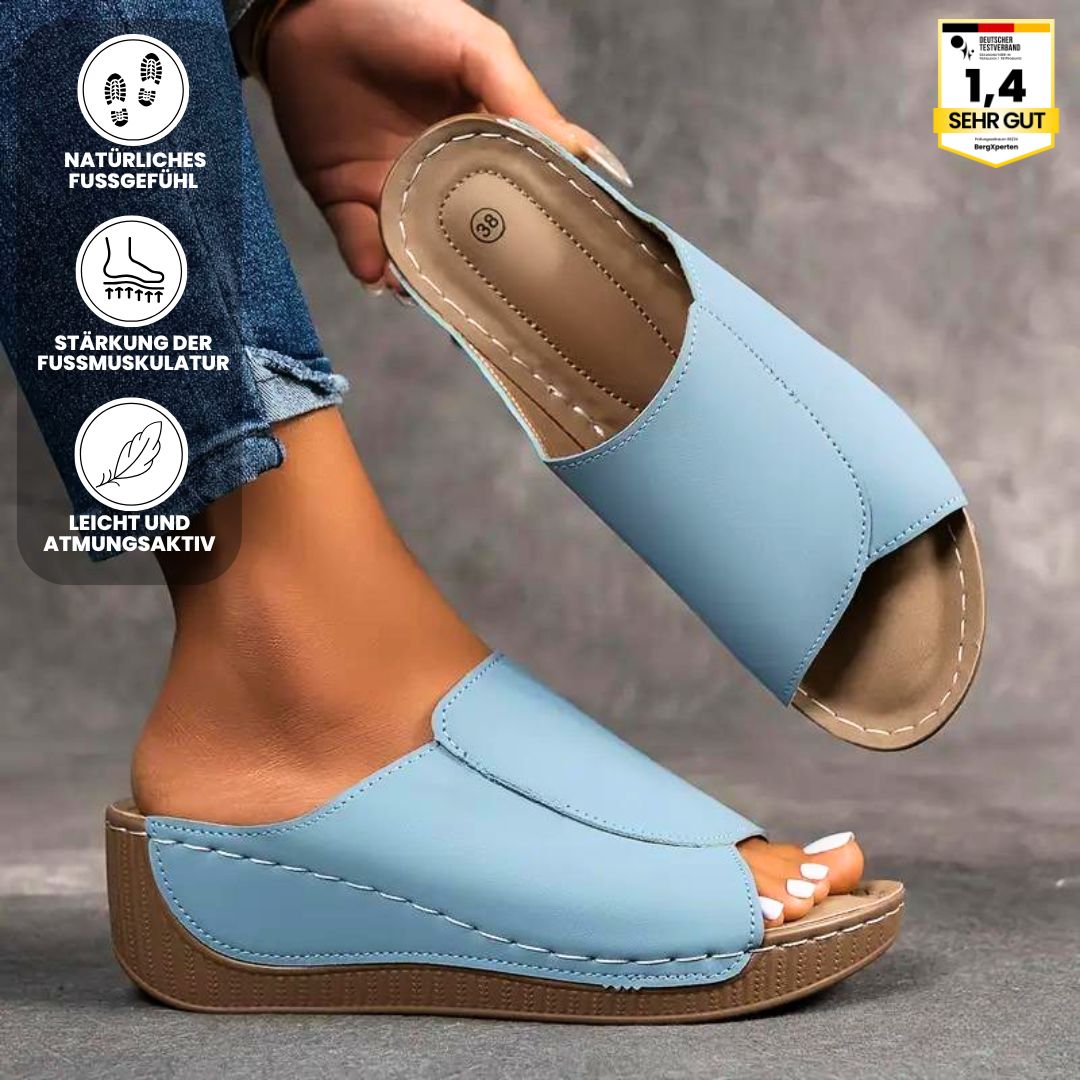 Ergonomiske, skridsikre sandaler i beige, der kombinerer komfort og stil, ideelle til enhver fodform og lejlighed.