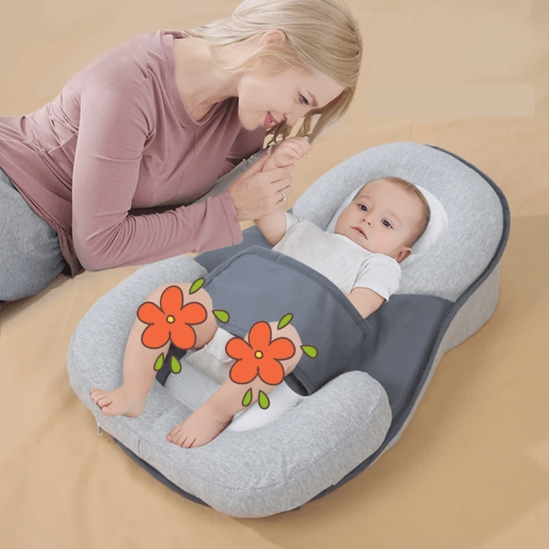 Ergonomisk babypude til spædbørn i blød bomuld, sikrer tryg og rolig søvn og komfort.