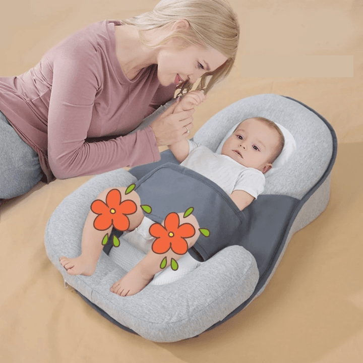 Ergonomisk babypude til spædbørn i blød bomuld, sikrer tryg og rolig søvn og komfort.