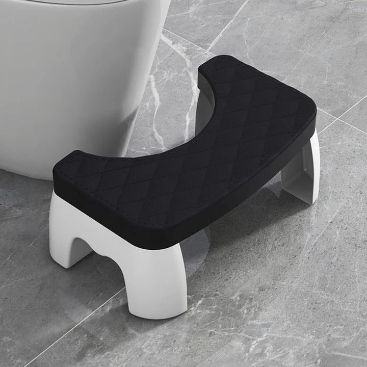 Robust badeværelsesskammel i plast, forbedrer balance og støtter en sund og ergonomisk kropsholdning.