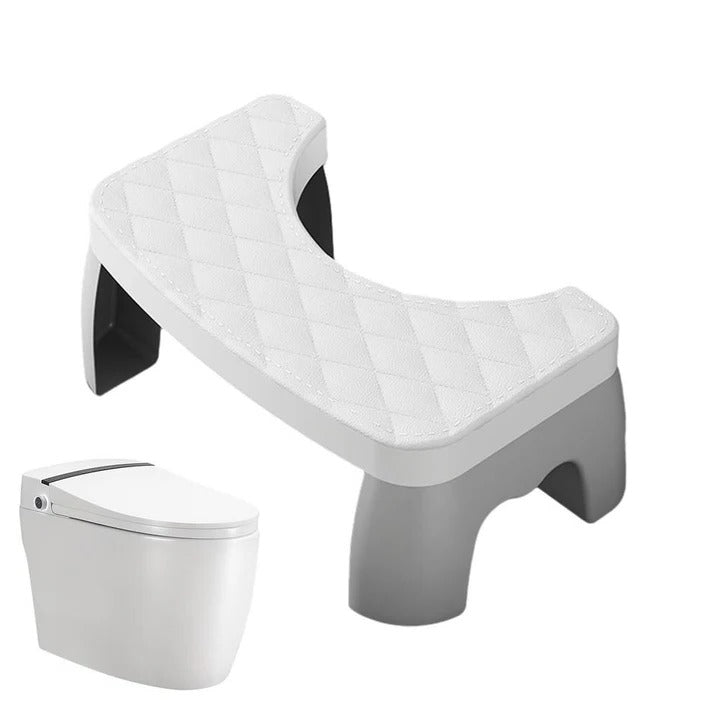 Skridsikker squat skammel i badeværelse til balance og sundhed; forbedrer kropsholdning ved toiletbrug.