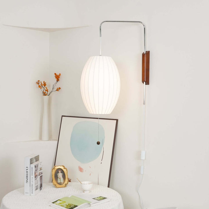 Moderne væglampe med kugledesign og varmt hvidt lys