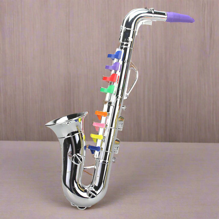 Holdbar børnesaxofon i plast, et trygt og underholdende musikinstrument for førskolebørn at øve sig på.
