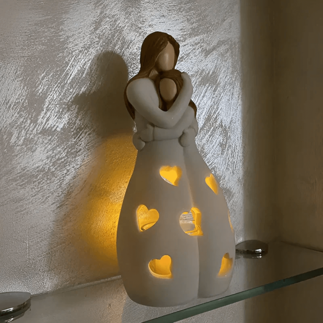 Mor og datter lysestage skulptur