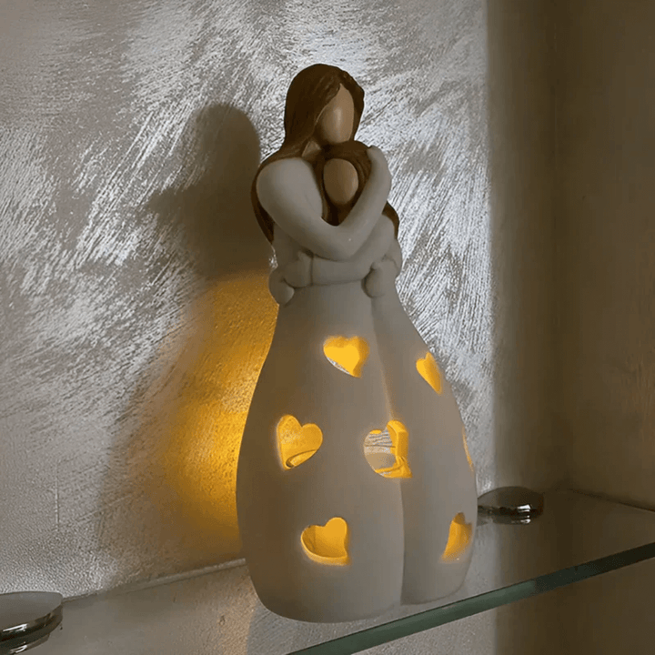 Mor og datter lysestage skulptur