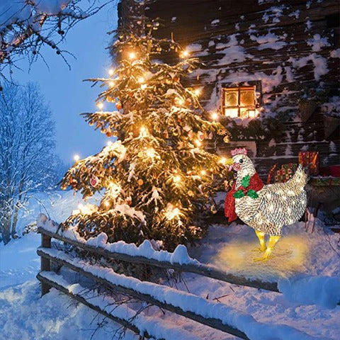 Hyggeligt dekorationslys formet som kylling med tørklæde. Perfekt til festlig juledekoration og udendørs julelys.