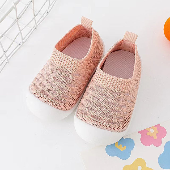 Strikkede baby barfods sokkesko, åndbare, skridsikre, i grå. Fleksibelt, behageligt design til små fødder.