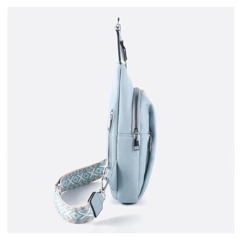 Geometrisk designet dame crossbody taske i ægte læder. Perfekt hverdagstaske med et moderne touch.