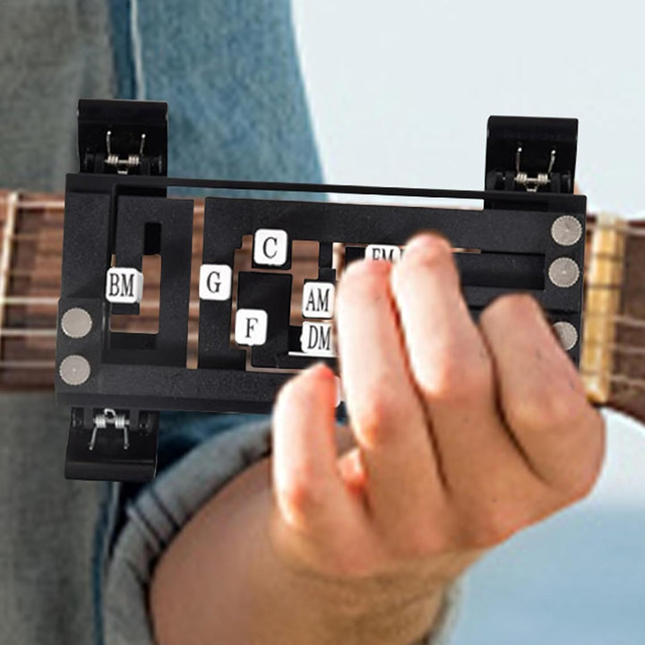 Begynder guitartræner til hurtig og nem akkordindlæring; reducerer fingersmerter.