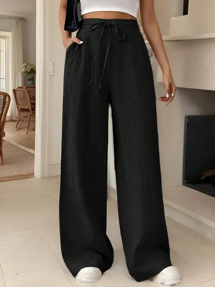 Stilfulde moderne damebukser i hør med wide leg og høj talje for en afslappet, luftig look.