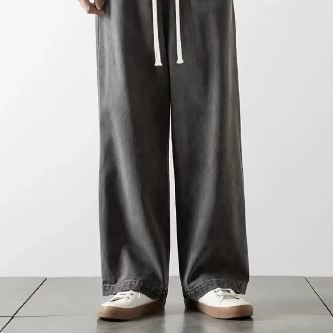 Autentiske herre baggy jeans i denim, designet med en rummelig, afslappet pasform og elastisk talje.