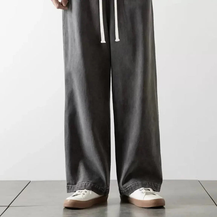 Autentiske herre baggy jeans i denim, designet med en rummelig, afslappet pasform og elastisk talje.