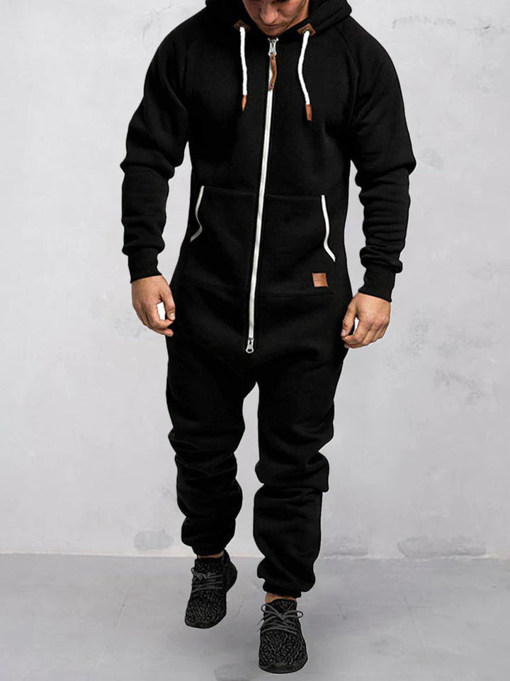 Alsidig herre jumpsuit med hætte i sort, en komfortabel hættetrøje og bukser i ét design.