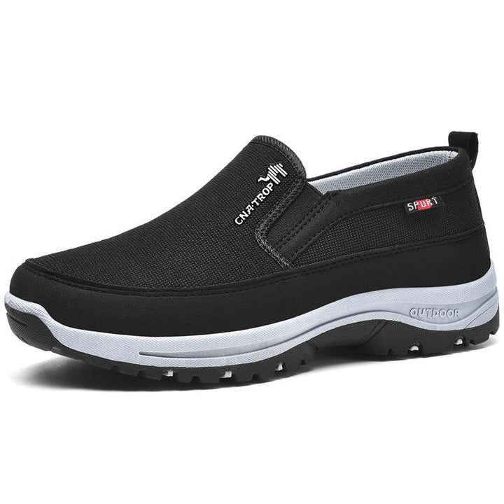 Funktionelle herre sneakers med nem slip-on design og pålidelig svangstøtte til aktiv brug.