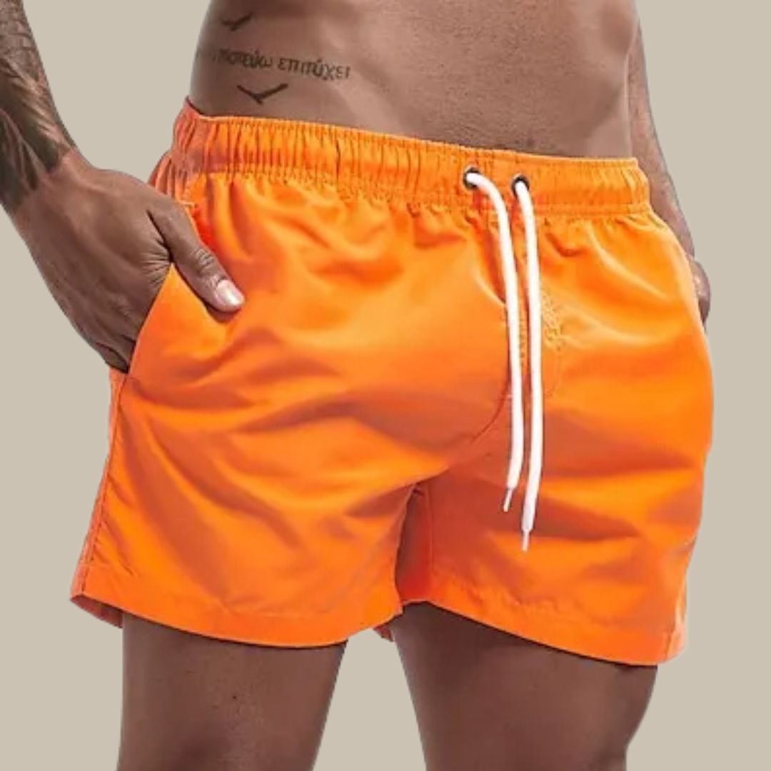 Turkise badeshorts til mænd, hurtigtørrende, elastisk linning, klassisk design; perfekt til sommeraktiviteter.