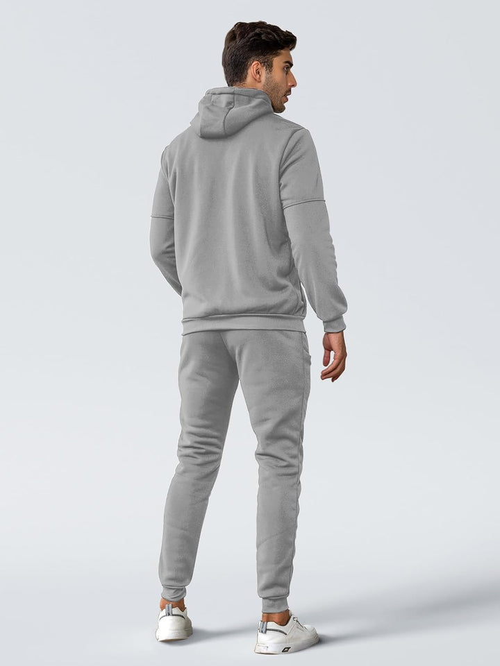 "Herren Slim-Fit-Trainingsanzug atmungsaktiv, dunkelblau, Vorderansicht, stilvoller Look, leichtes Material für Sport & Freiz