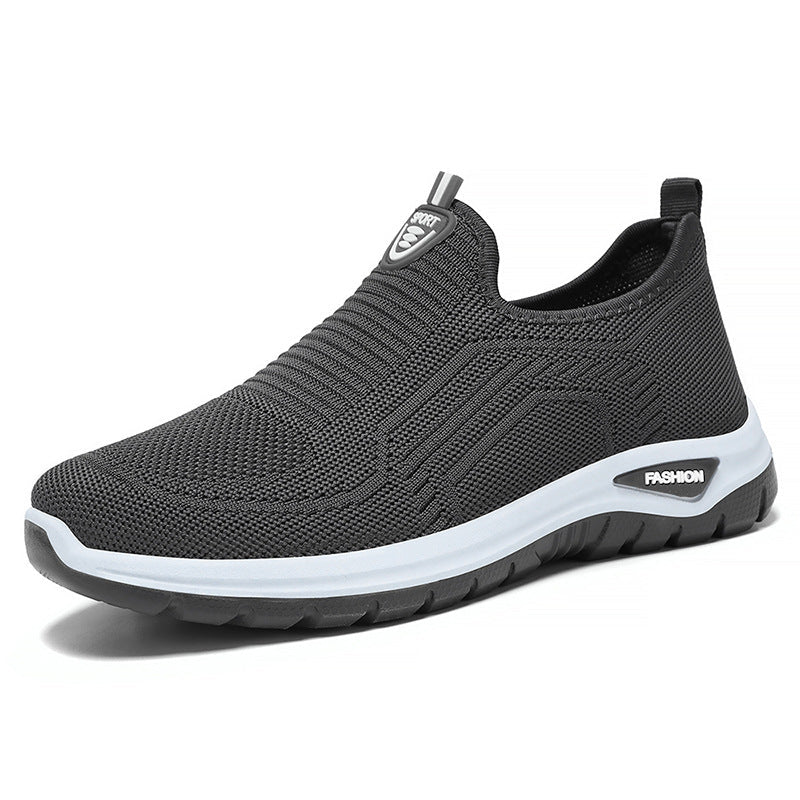 Herre slip-on sneakers, åndbare og fleksible, til byvandring og fritidsaktiviteter. Stilrent design i sort og grå.