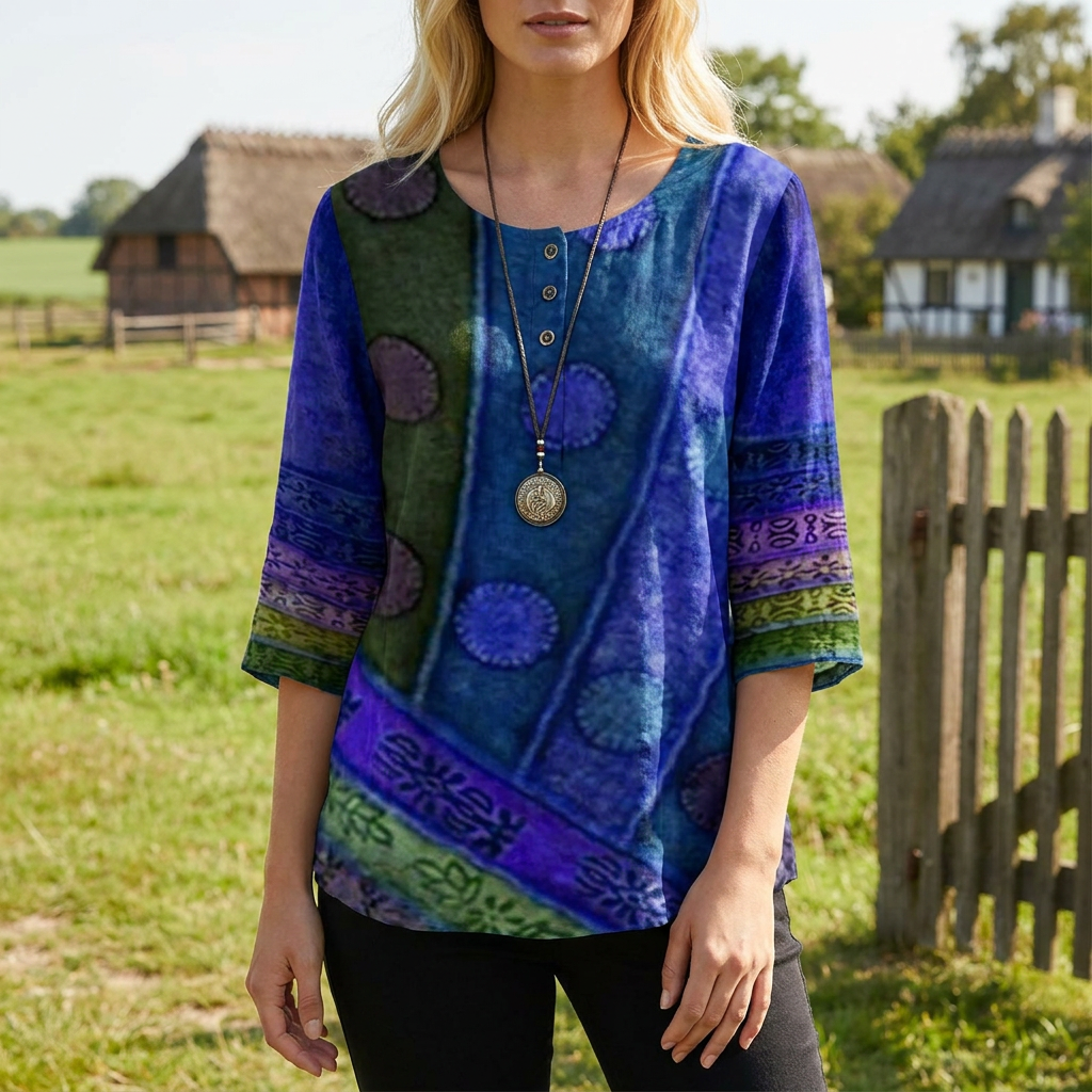 Kvinder's sommerbluse med farverigt blomsterprint, rund hals, knapdetaljer og stilfuld pasform.