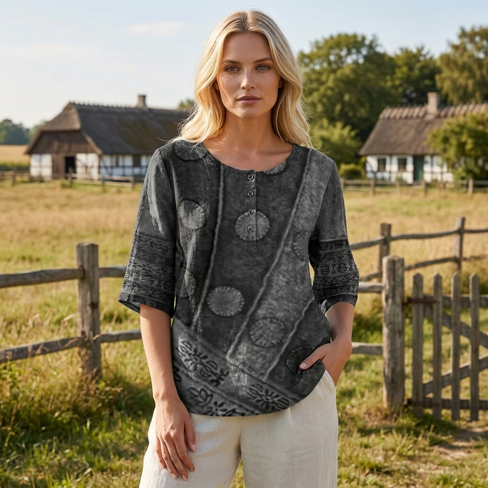Stilfuld dame bluse med blomsterprint, perfekt til sommer. Komfortabel pasform med rund hals.