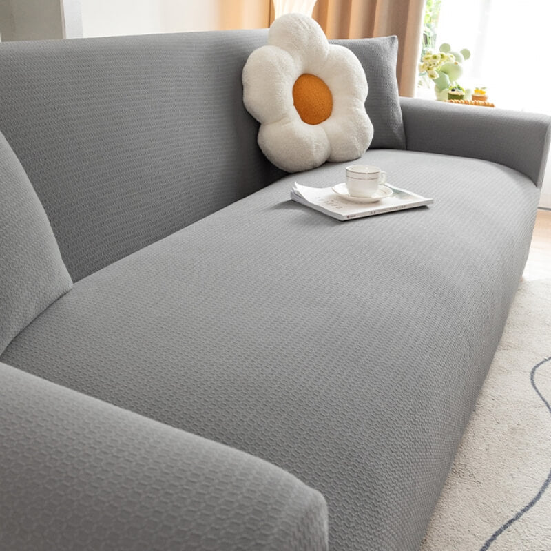 Høj-elastisk, vandtæt sofabetræk i beige, ridsefast og tilpasningsdygtigt for perfekt beskyttelse og stilrent design