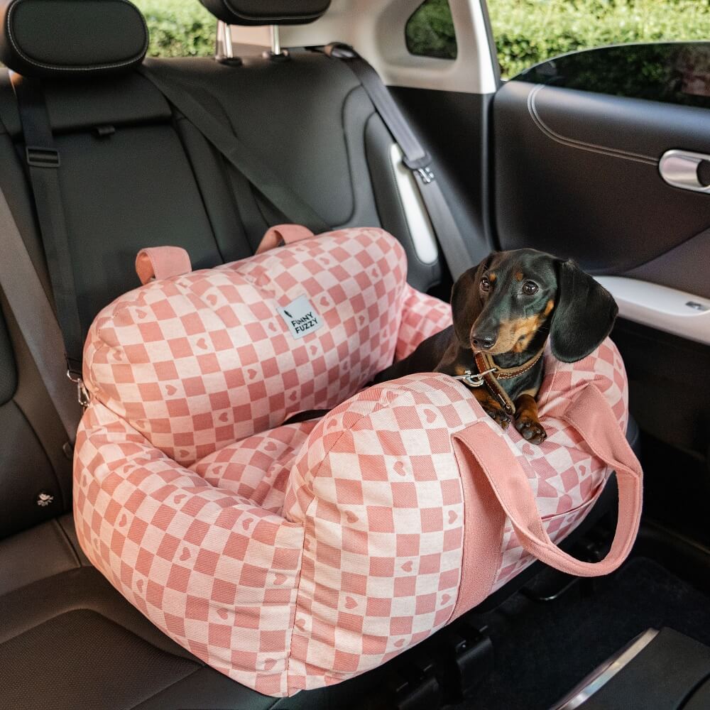 "Hunde-Autositzbett, grau, Einzelsitz, mit verstellbaren Gurten und abnehmbarem Bezug für Sicherheit und Komfort."