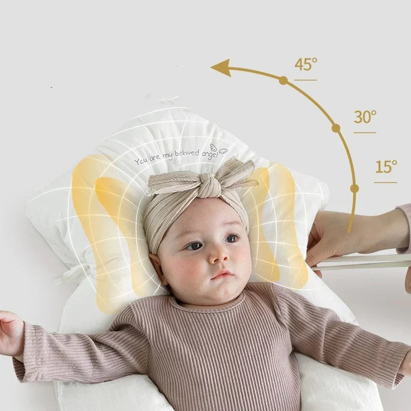 Allergivenlig babyhovedpude, blød og åndbar, giver ergonomisk støtte for sund søvn.