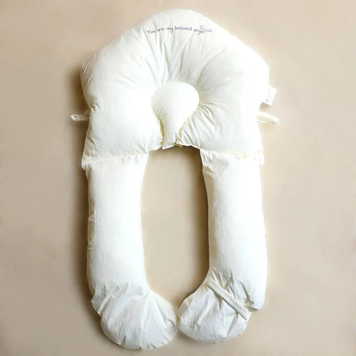 Allergivenlig babyhovedpude, blød og åndbar, giver ergonomisk støtte for sund søvn.