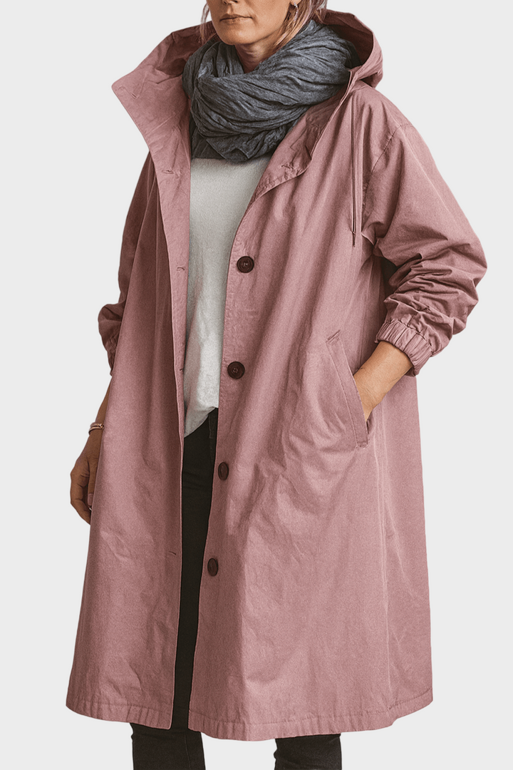 Vejrbestandig dame trenchcoat, ideel som stilfuld forårs- og efterårsfrakke.