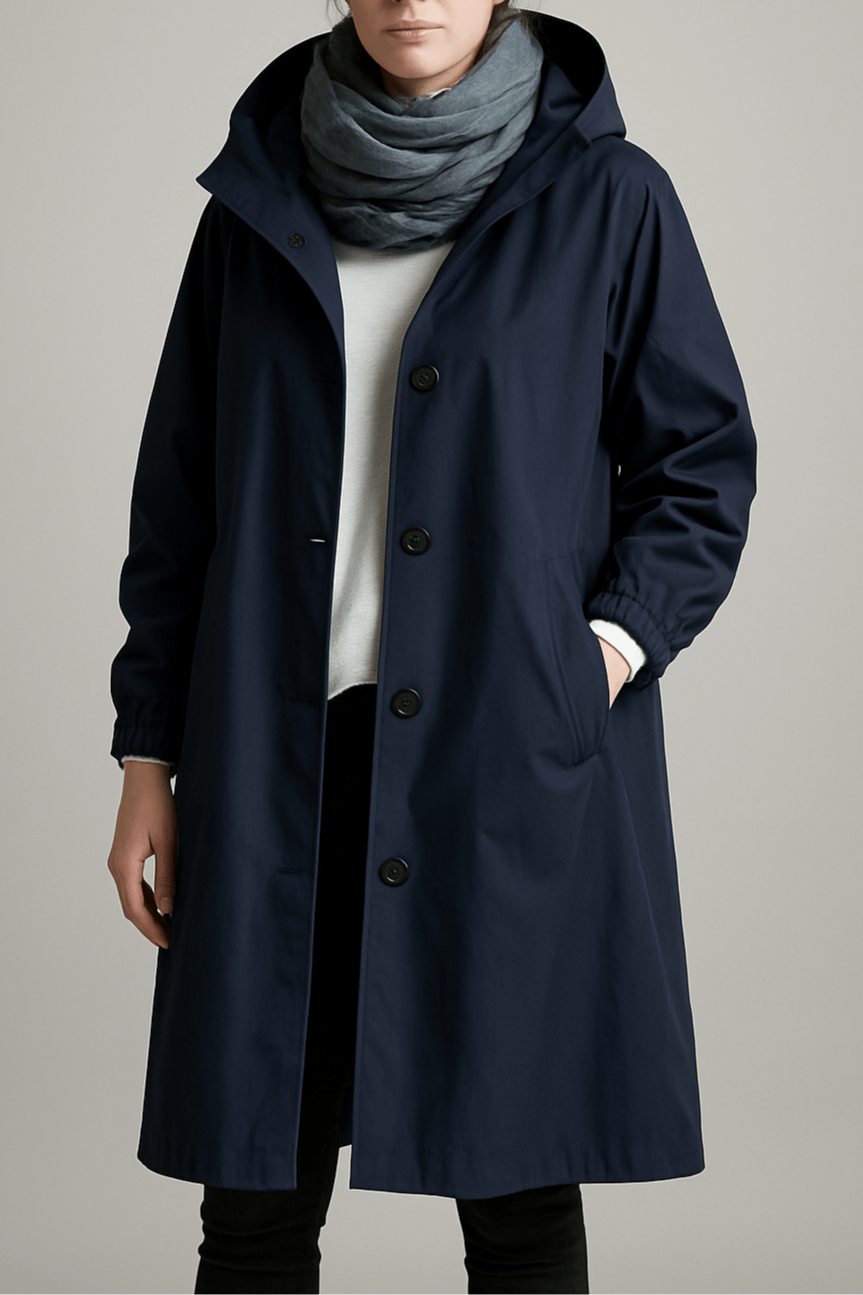 Fuld længde billede af elegant dame trenchcoat. En stilfuld og klassisk lang frakke.