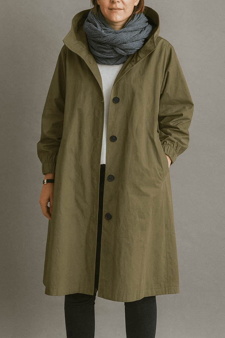 Dame overtøj: elegant trenchcoat med tidløst design, perfekt til at fuldende dit stilfulde look.