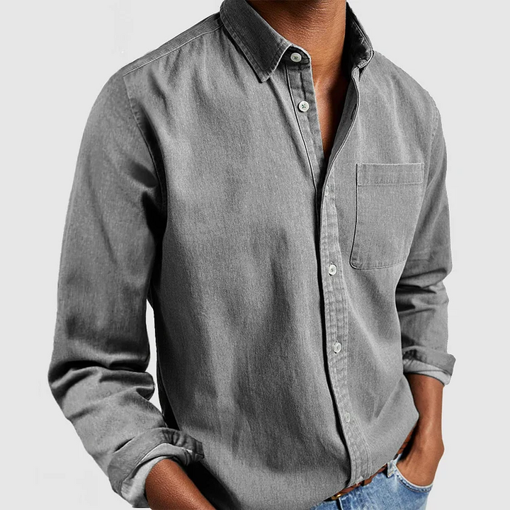 Elegant herreskjorte med knapper, klassisk design. Langærmet button-down for et stilfuldt look.