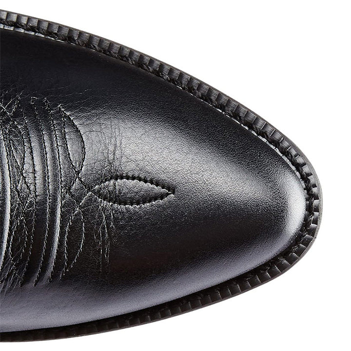 Moderigtige cowboystøvler til mænd, set fra siden; viser den elegante silhuet og robuste sål.