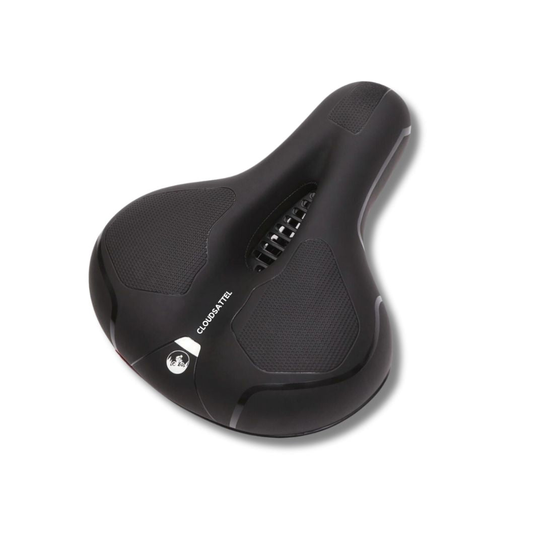 Komfortabel, reflekterende cykelsadel i sort, vejrbestandig, med optimal ventilation for smertefri cykling.